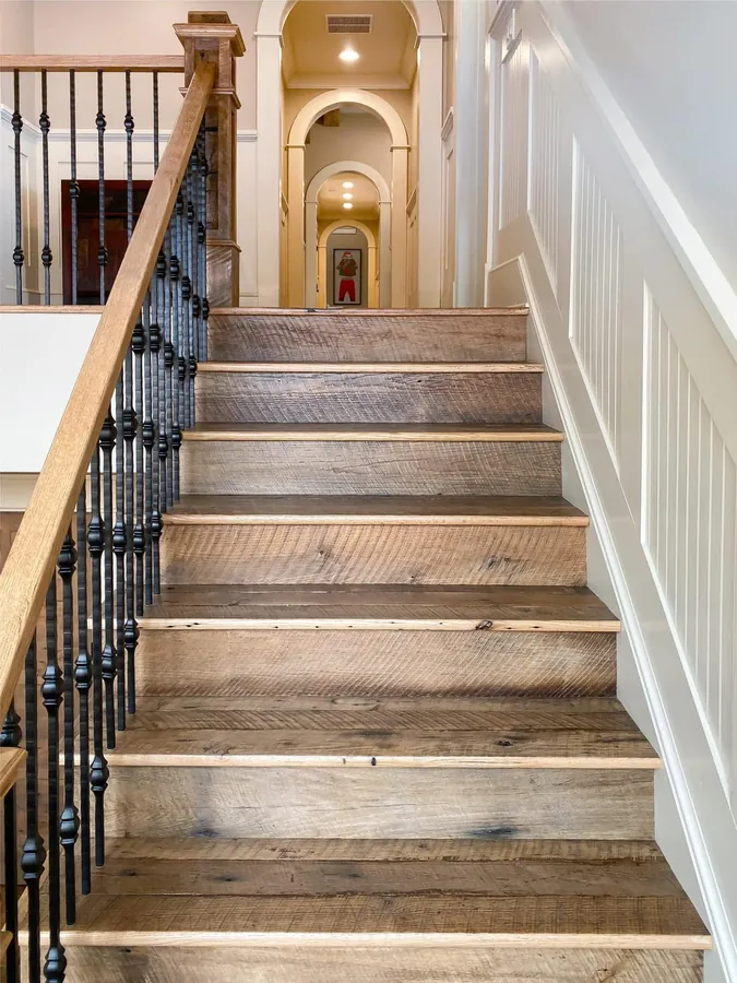 Timber staircase with metal spindles