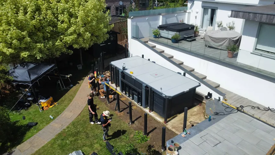 The JJC team building the decking around a swim spa